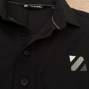 Travis Matthew Black Golf collared shirt. NEW!